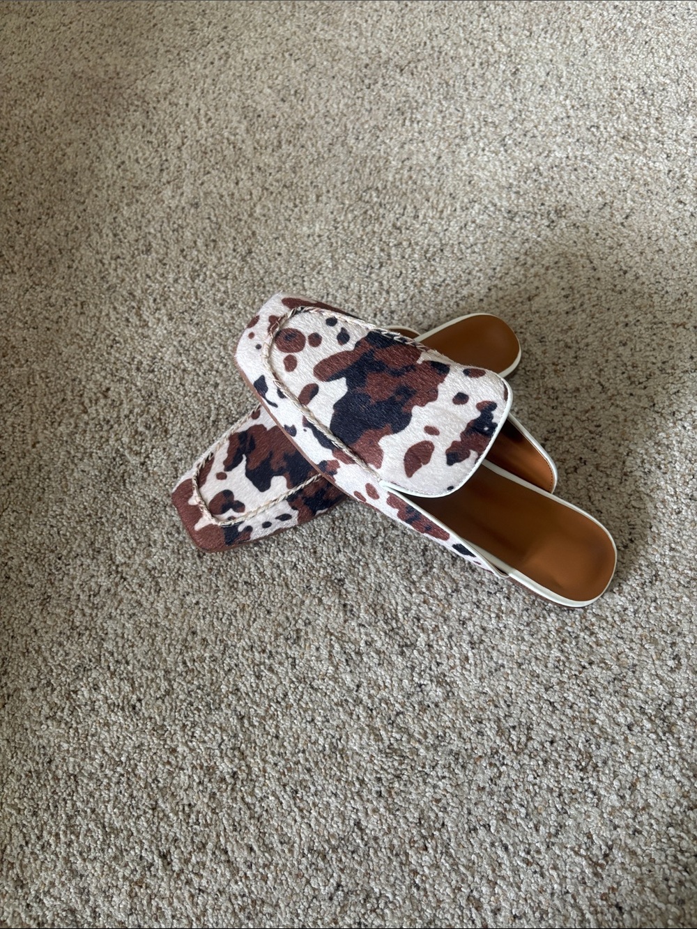 Cowhide Print Slip-On Mules in Brown and White